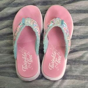 twinkle toe flip flops